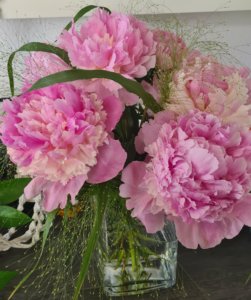 Vase mit Blumen für Mama